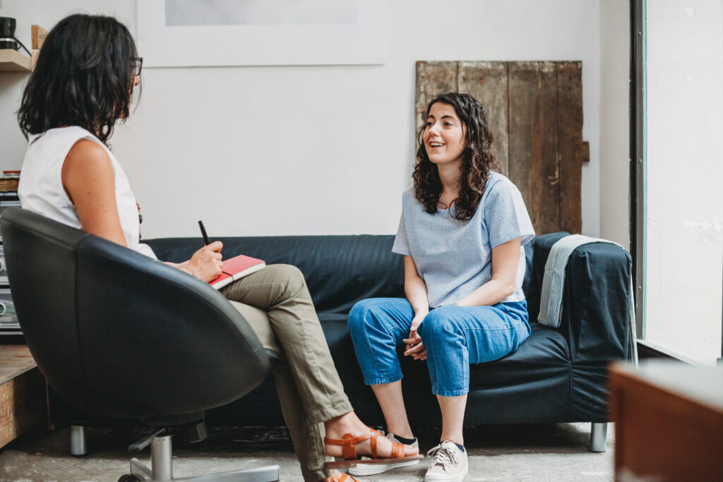 sychotherapy session, woman talking to his psychologist in the